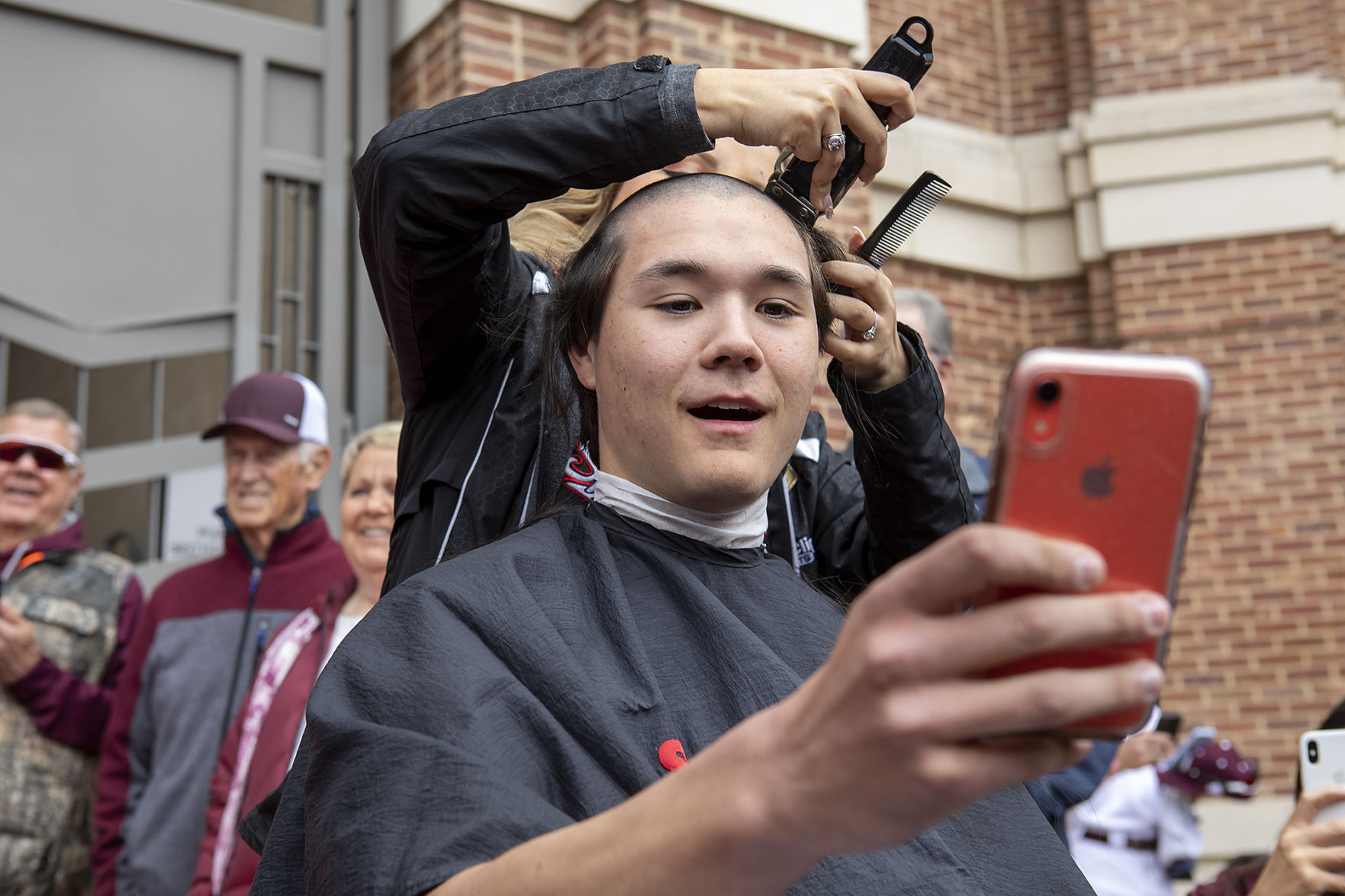 A&M baseball head shaving for cancer